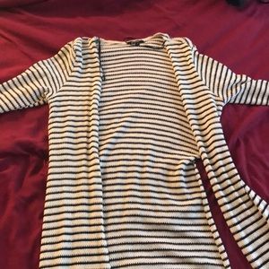 Long cream and black cardigan with side slits